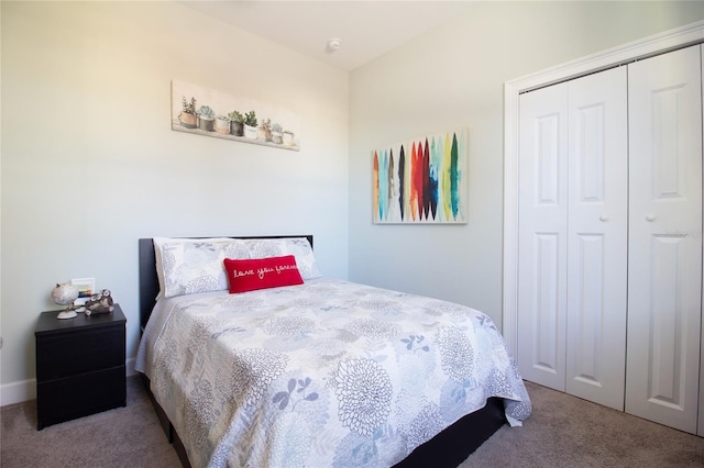 carpeted bedroom with a closet