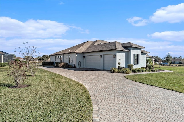 view of side of home featuring a yard and a garage