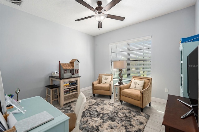 home office with ceiling fan