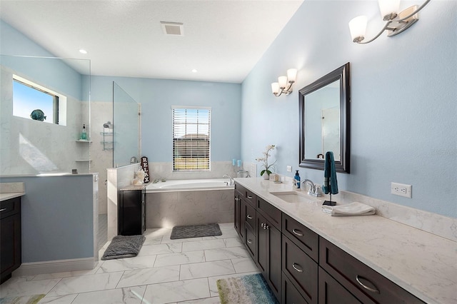 bathroom featuring vanity and plus walk in shower