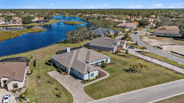 birds eye view of property featuring a water view