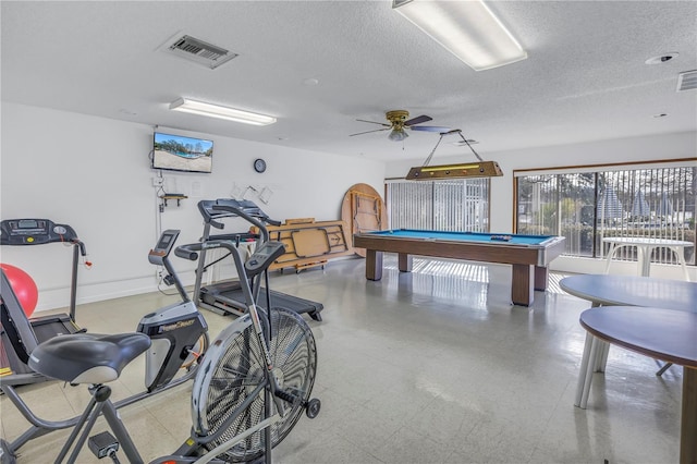 recreation room with a textured ceiling, ceiling fan, and billiards