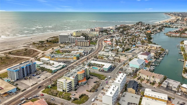 aerial view featuring a water view and a beach view