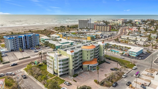 bird's eye view with a water view and a view of the beach