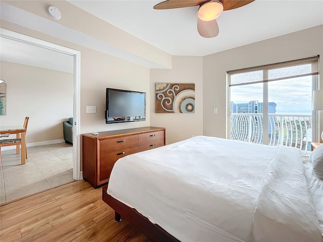 bedroom with access to outside, ceiling fan, and light wood-type flooring