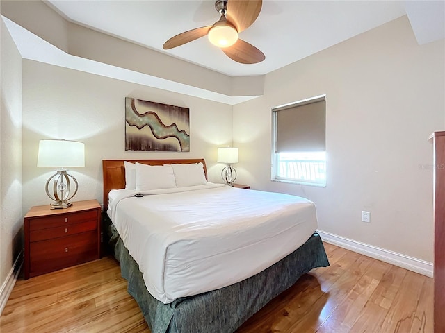 bedroom featuring ceiling fan and light hardwood / wood-style floors