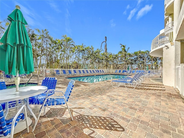 view of pool with a patio