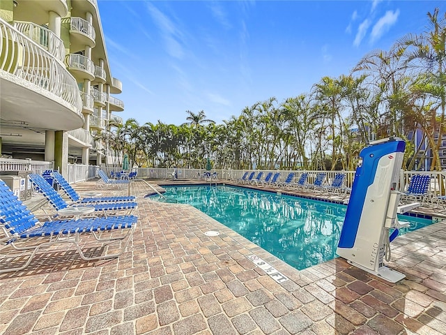 view of pool featuring a patio area