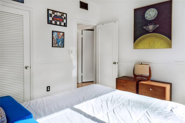 bedroom with visible vents