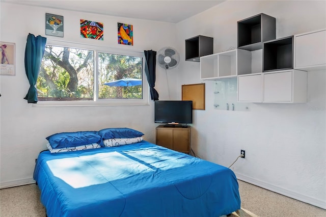 bedroom with baseboards