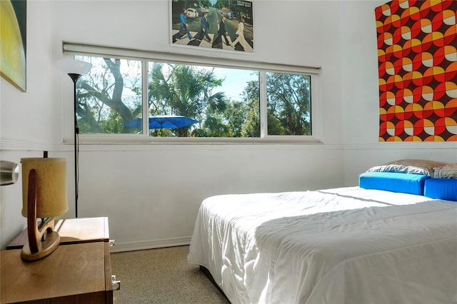 bedroom with speckled floor