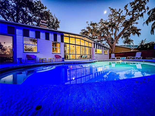 view of pool featuring a fenced in pool and a patio