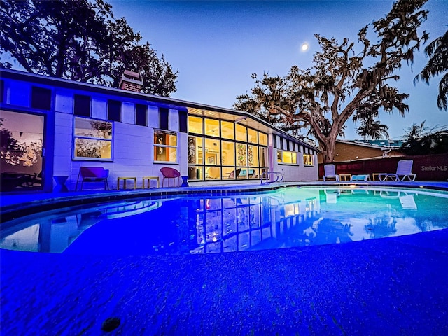 view of pool with a patio area and a fenced in pool