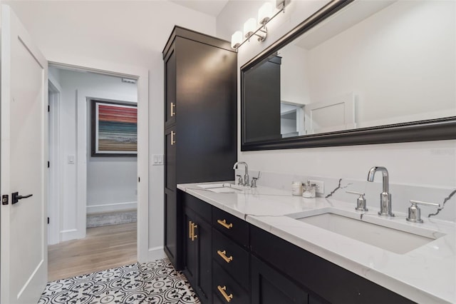 bathroom with vanity and tile patterned floors