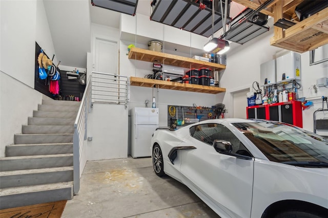 garage featuring white fridge