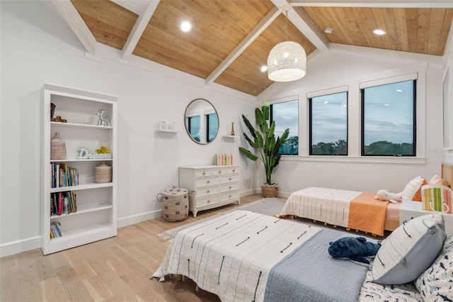 bedroom with vaulted ceiling with beams, light wood-type flooring, and wood ceiling