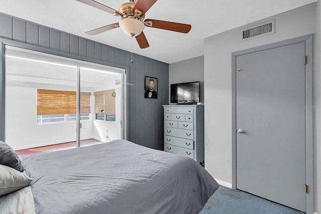 carpeted bedroom with ceiling fan