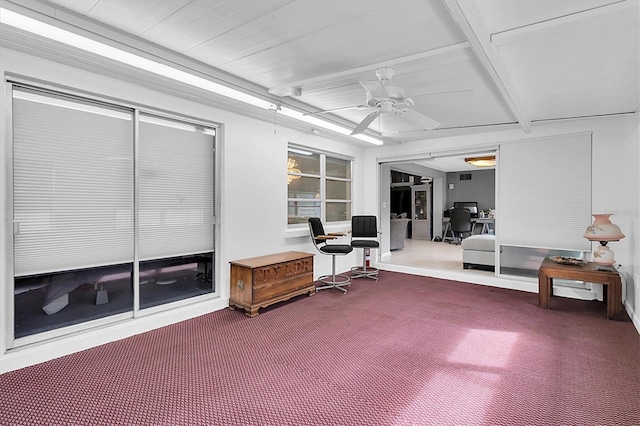 home office with ceiling fan and carpet flooring