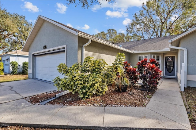 single story home featuring a garage