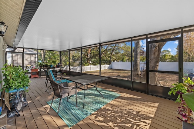 unfurnished sunroom featuring plenty of natural light