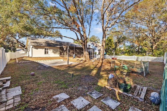 view of yard with a patio area