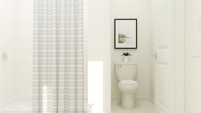 bathroom featuring tile patterned floors, toilet, and walk in shower