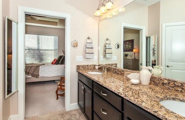 bathroom featuring tile patterned floors and vanity