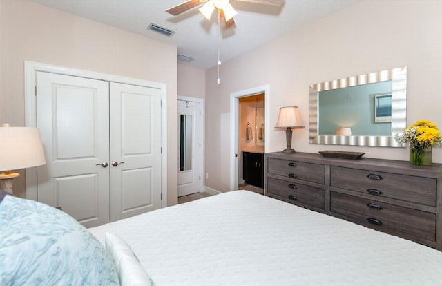 bedroom with ensuite bathroom and ceiling fan