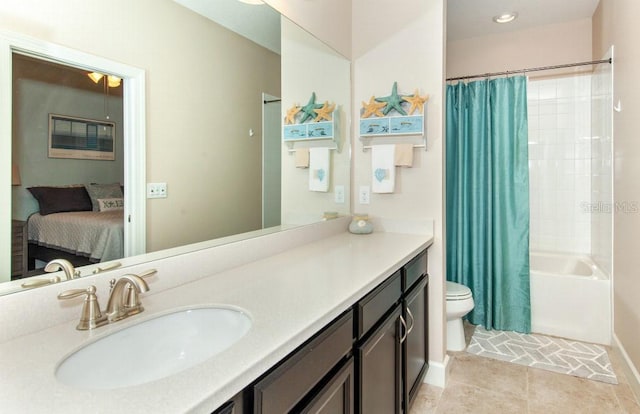 full bathroom featuring shower / bath combo, toilet, and vanity