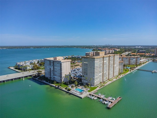 birds eye view of property featuring a water view