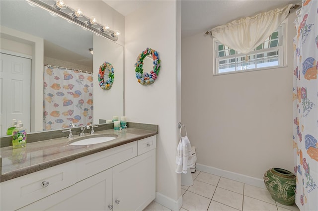 bathroom featuring vanity and tile patterned floors