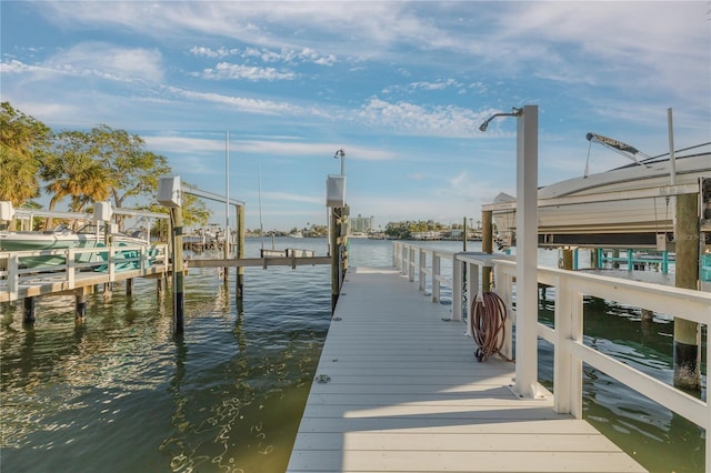 dock area featuring a water view