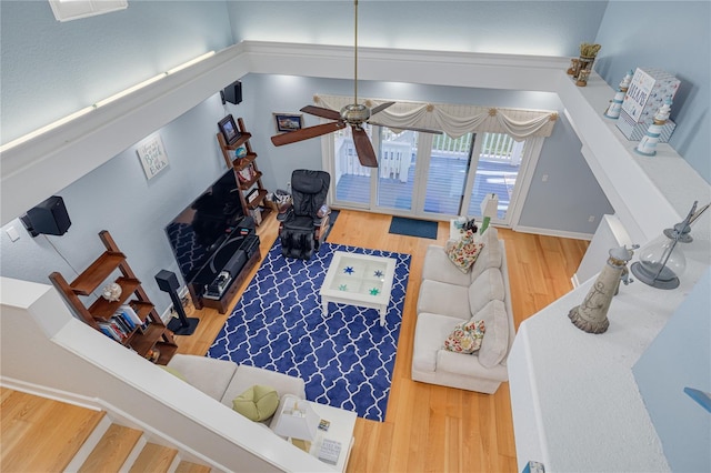 238 71st Ave, St Pete Beach, FL 33706 - living area with wood finished floors and ceiling fan