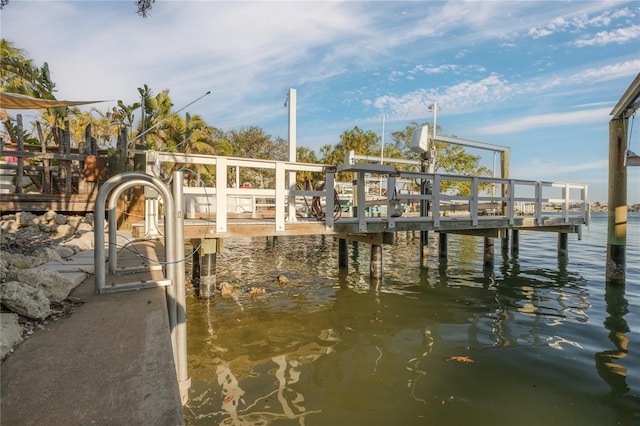 238 71st Ave, St Pete Beach, FL 33706 - dock area featuring a water view