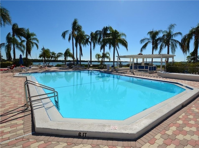 view of swimming pool featuring a patio