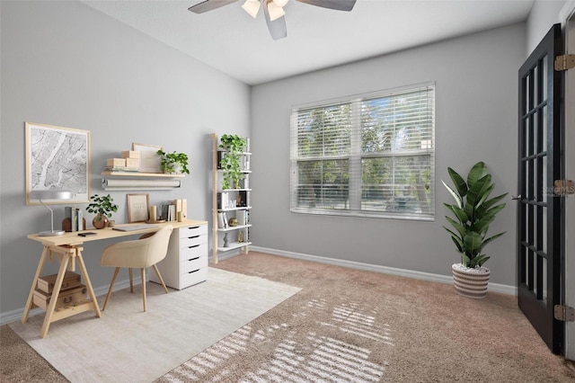 office area featuring carpet and ceiling fan