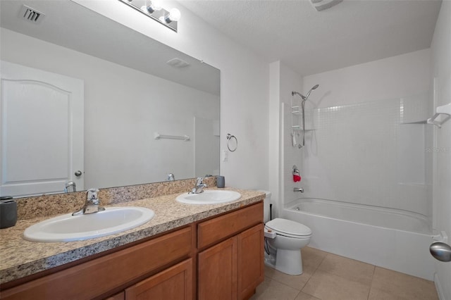 full bathroom with tile patterned flooring, vanity,  shower combination, and toilet