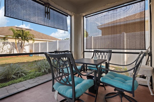 sunroom / solarium featuring plenty of natural light