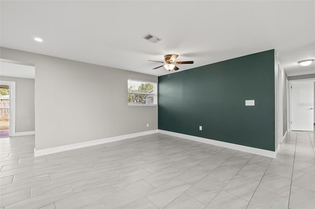 unfurnished room featuring ceiling fan