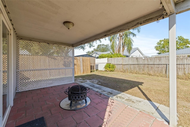 view of patio / terrace featuring a fire pit