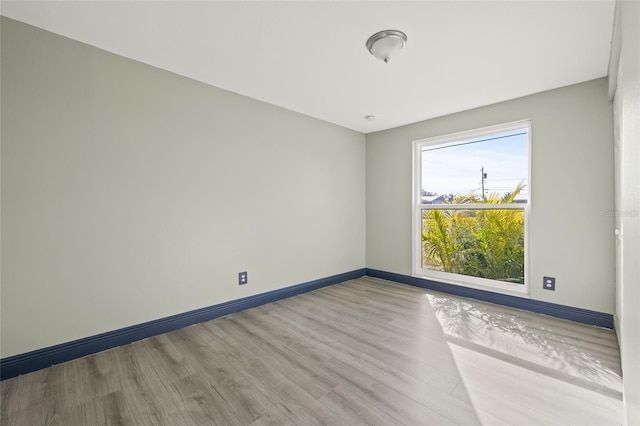 empty room featuring light hardwood / wood-style floors