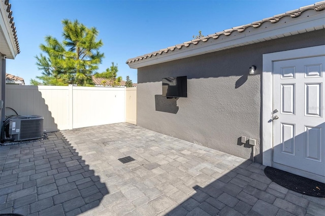 view of patio featuring cooling unit