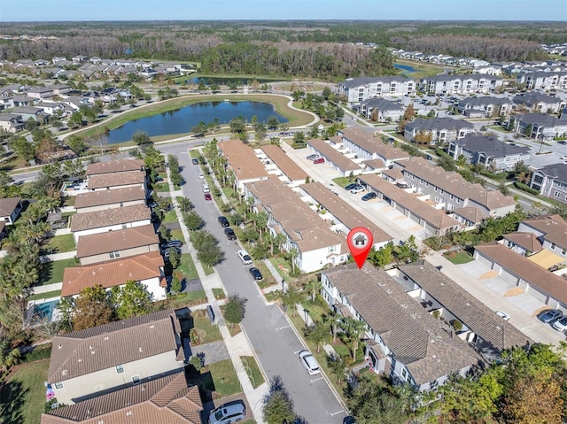 bird's eye view with a water view