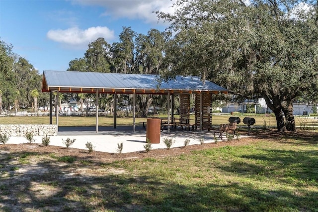 surrounding community with a gazebo and a lawn