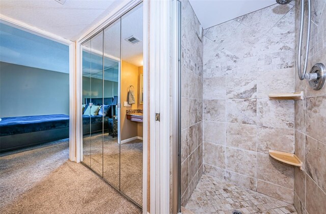 bathroom featuring an enclosed shower