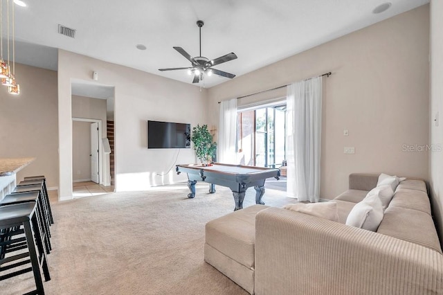 rec room featuring light carpet, ceiling fan, and billiards