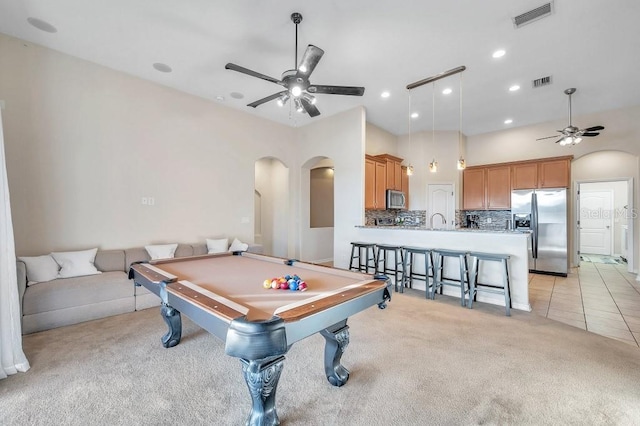 game room with ceiling fan, light carpet, and pool table