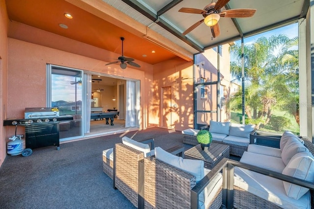 view of patio with outdoor lounge area, ceiling fan, and grilling area