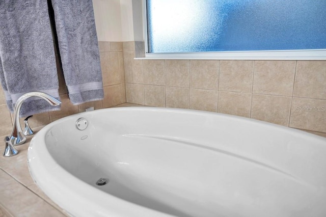 bathroom featuring a tub