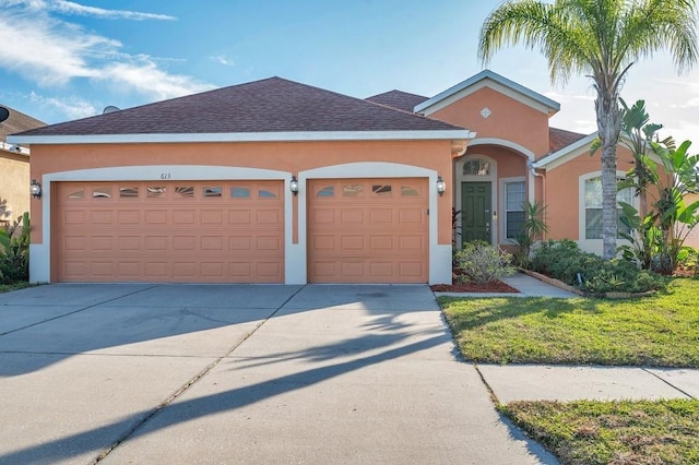 ranch-style house featuring a garage